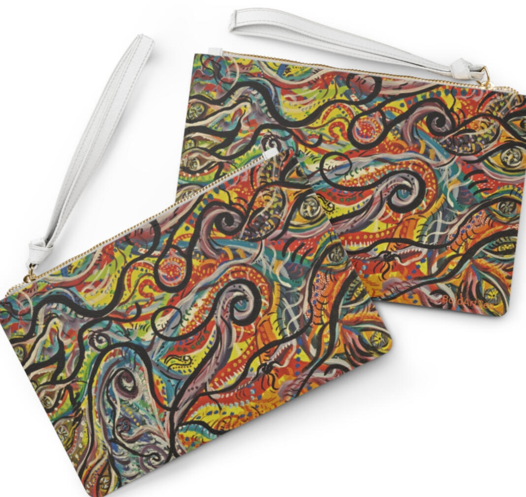 $50 Clutch bag. There are two styles you can choose from either the all eyes on you (above) or the coral design (below). Each one sold separately.